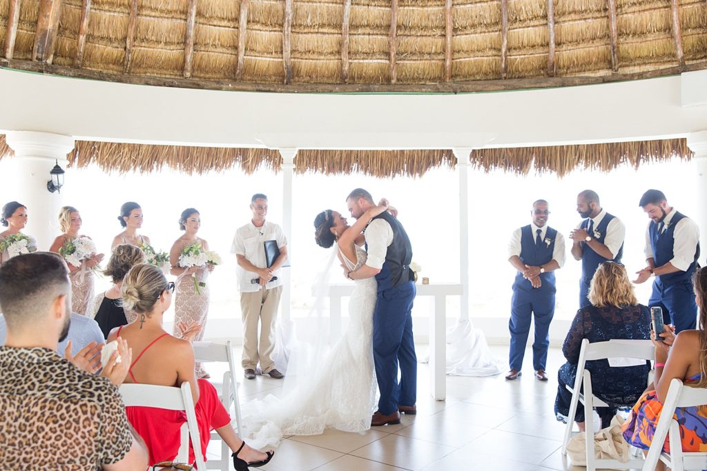 Hard Rock Riviera Maya destination wedding. Photos by Rich Paprocki in Rochester NY. first kiss in Mexico